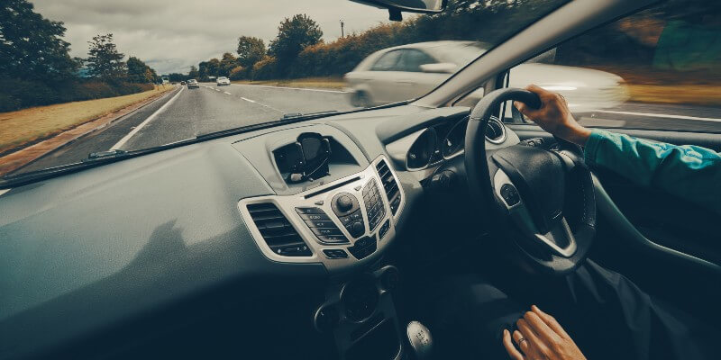 Woman Driving On Dual Carridgeway